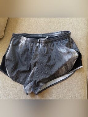 Nike women’s dry fit athletic shorts. Size Small black/white with zip pocket